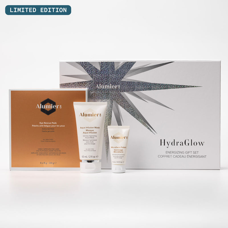 HydraGlow gift set box behind 3 AlumierMD products